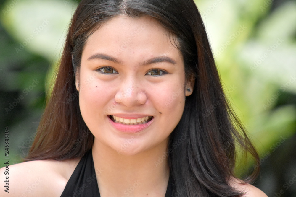 Youthful Filipina Female Smiling