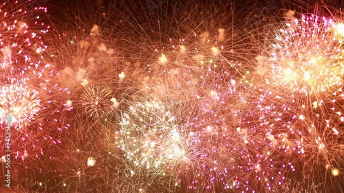 Colorful fireworks exploding in the night sky. Celebrations and events in bright colors. photo