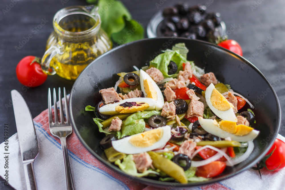 Nicoise salad with tuna, green beans, basil and fresh vegetables