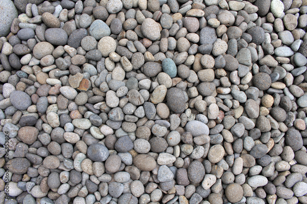 Pebbles, rocks, and stones as natural decoration in the garden Pebbles, rocks, and stones as natural decoration in the garden