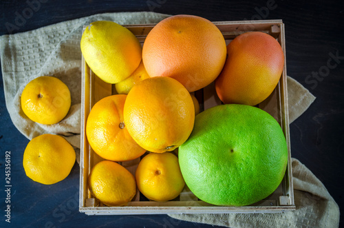 different citrus fruits in the box