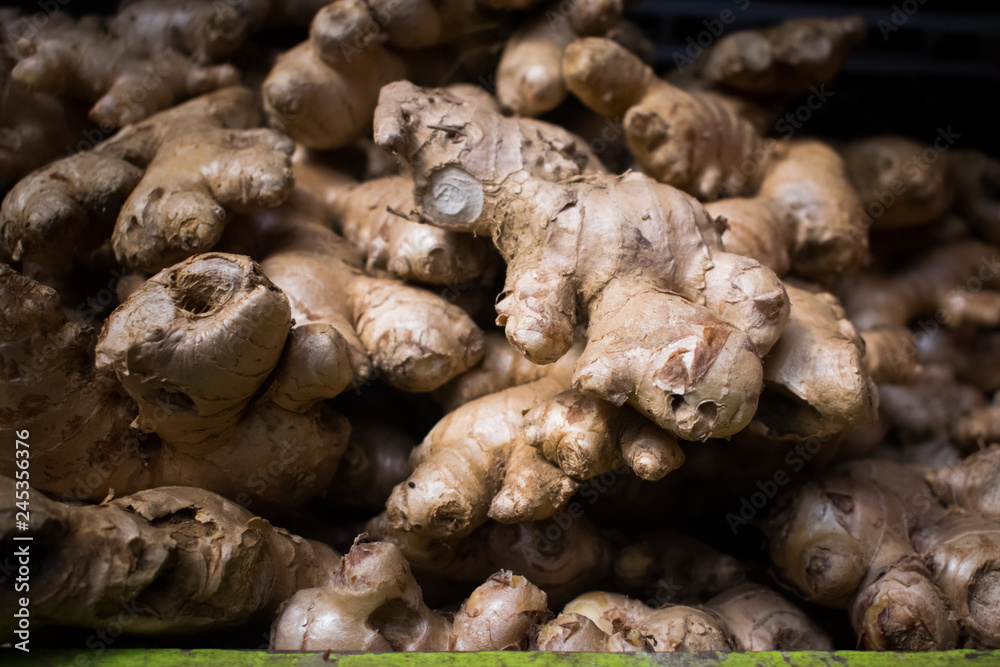 Close up of a fresh ginger on display Close up of a fresh ginger on display