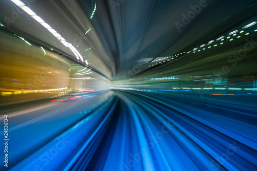 Motion blur from Yurikamome Line moving inside tunnel in Tokyo, Japan