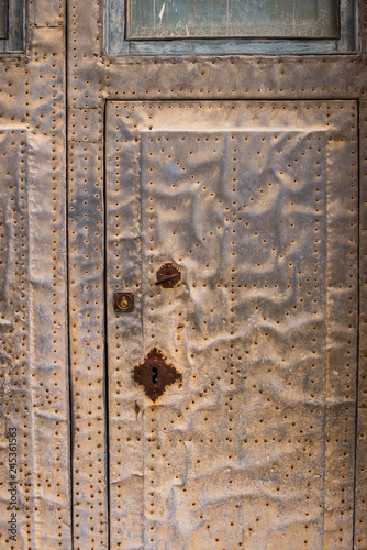 Detail take of a studded door