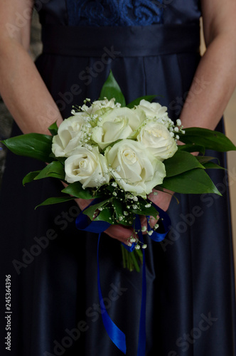 Beautiful wedding bouquet in hands of the bride. Wedding concept