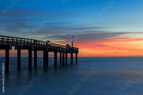 Sunrise over the Atlantic Ocean at the St. Augustine Beach Pier in St. Augustine, Florida