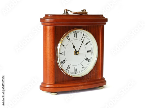 Wooden table clock. Isolated with clipping path.