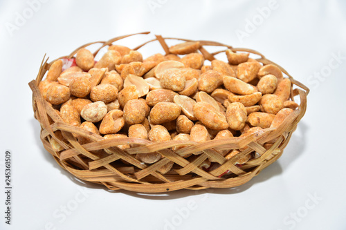 Spicy peanuts on a wooden platter