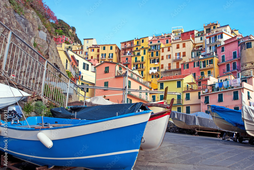 Magical landscape with boats on the streets of Manarola in Cinque Terre, Liguria, Italy, Europe