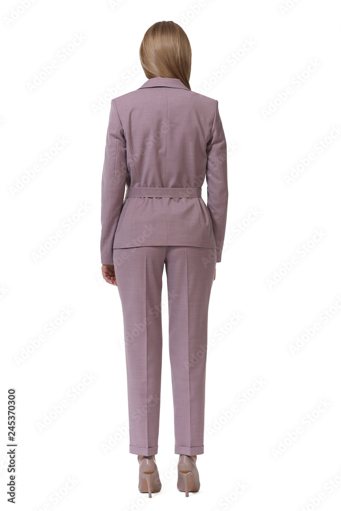 young caucasian business woman executive posing in pink official pant suit young caucasian business woman executive posing in pink official pant suit