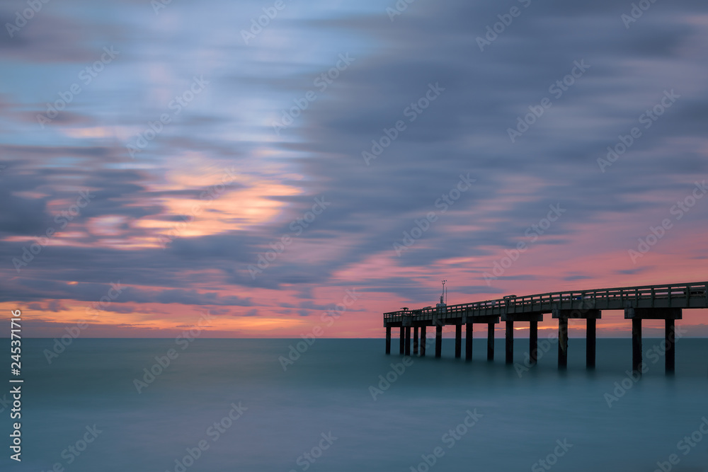 Sunrise over the Atlantic Ocean at St. Augustine Beach Pier in St. Augustine, Florida