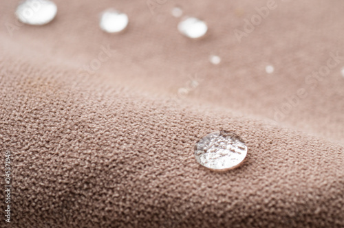 Water repellent and waterproof fabrics. How to waterproof fabric with these simple instructions for Experiment by drop water on it photo