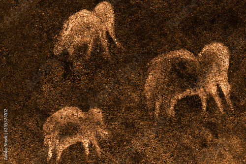 image of ancient mammoths on the cave wall. archaeology. ancient history.