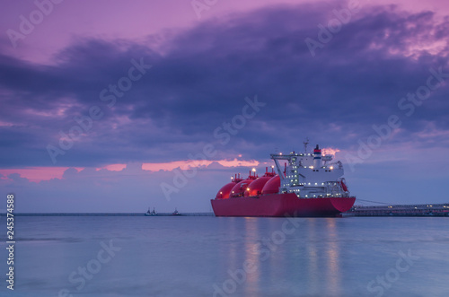 LNG TANKER - Ship at dawn moored to the gas terminal

