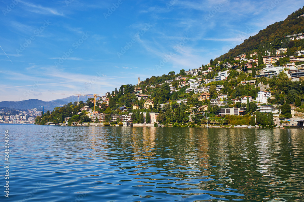 Scenic view of Gandria village near Lugano from the lake, Switzerland Scenic view of Gandria village near Lugano from the lake, Switzerland