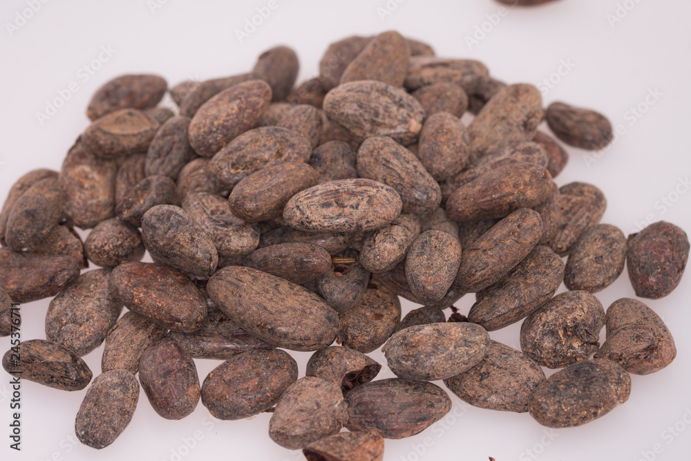 pile of Cocoa beans on white background