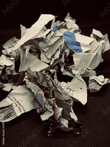 torn and crumpled newspaper