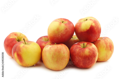 fresh "honey crunch" apples on a white background