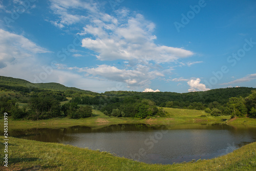 landscape with lake and blue sky © Irina