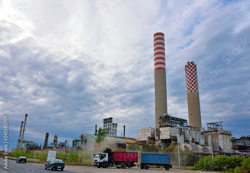 industrial area petrochemical chimneys seen from the highway  Gela Italy