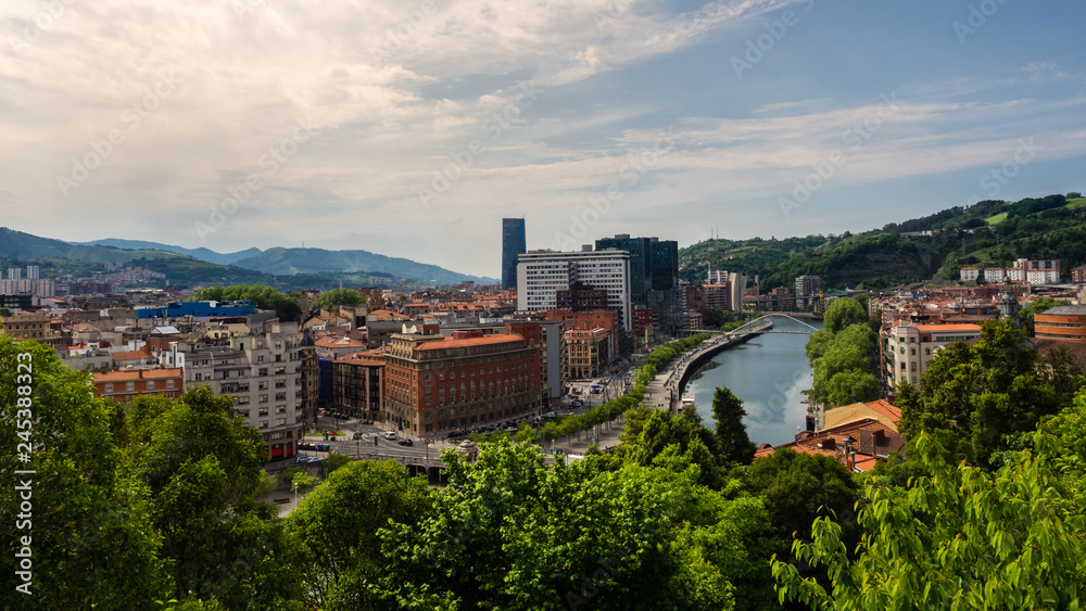 Views of the Abandoibarra promenade next to the river in Bilbao