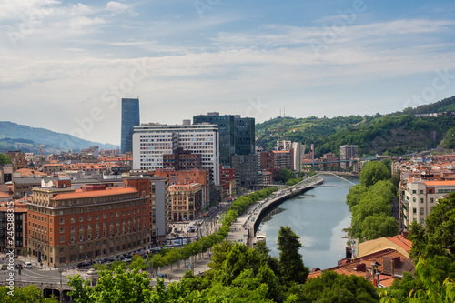 Views of the Abandoibarra promenade next to the river in Bilbao photo