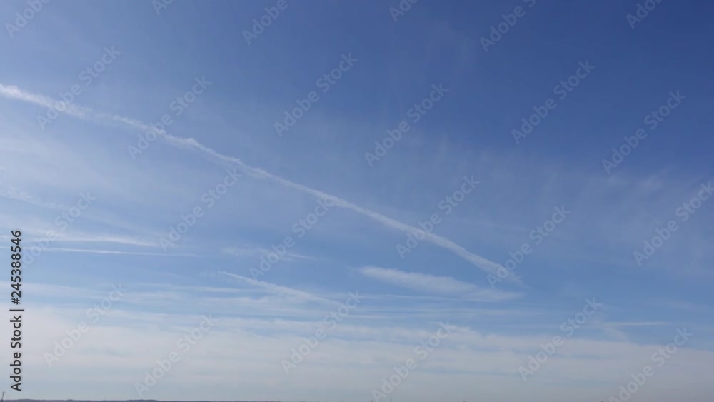 Several Jet Streaks In Cloudy Sky With Horizon On Bottom Timelapse Several Jet Streaks In Cloudy Sky With Horizon On Bottom Timelapse