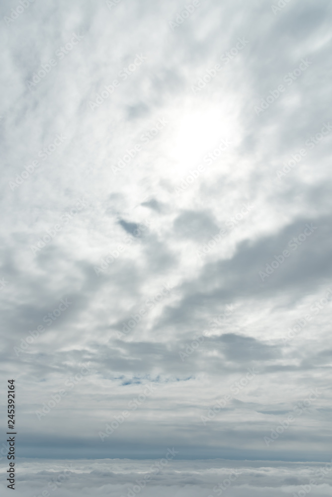 Blue sky background, viewed from an airplane window. Blue sky background, viewed from an airplane window.