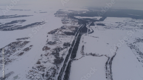 Frozen river and forest in snow view Fromm 500 meter , drone shoot ,areal photo 