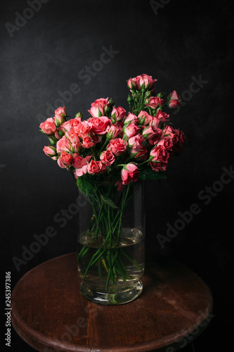 flower Ikibana on a black background  bouquet in a glass vase