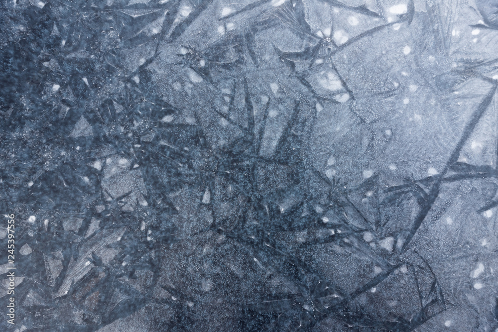 Fototapeta premium Background of cracked blue shining ice - perfect use for portrait or other purposes - high resolution