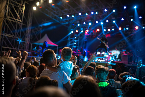 Crowded concert for adults and children alike