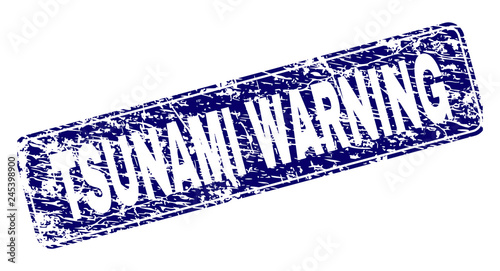 TSUNAMI WARNING stamp seal print with grunge texture. Seal shape is a rounded rectangle with frame. Blue vector rubber print of TSUNAMI WARNING title with grunge texture.
