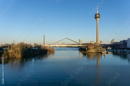 Duesseldorf, GERMANY - January 20, 2019: Modern architecture of New Harbour City is touched by warm light of sinking sun
