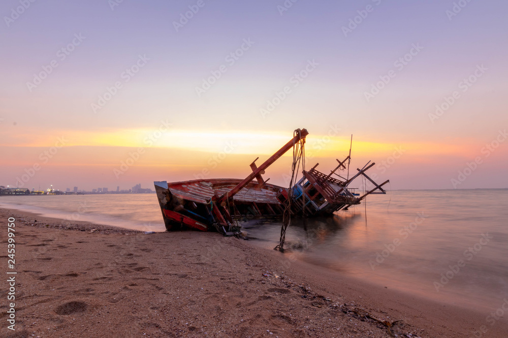 Fishing boat wrecks on the beach Sunset Fishing boat wrecks on the beach Sunset