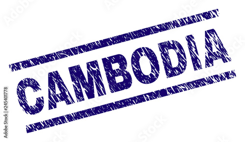 CAMBODIA seal print with distress style. Blue vector rubber print of CAMBODIA label with unclean texture. Text label is placed between parallel lines.