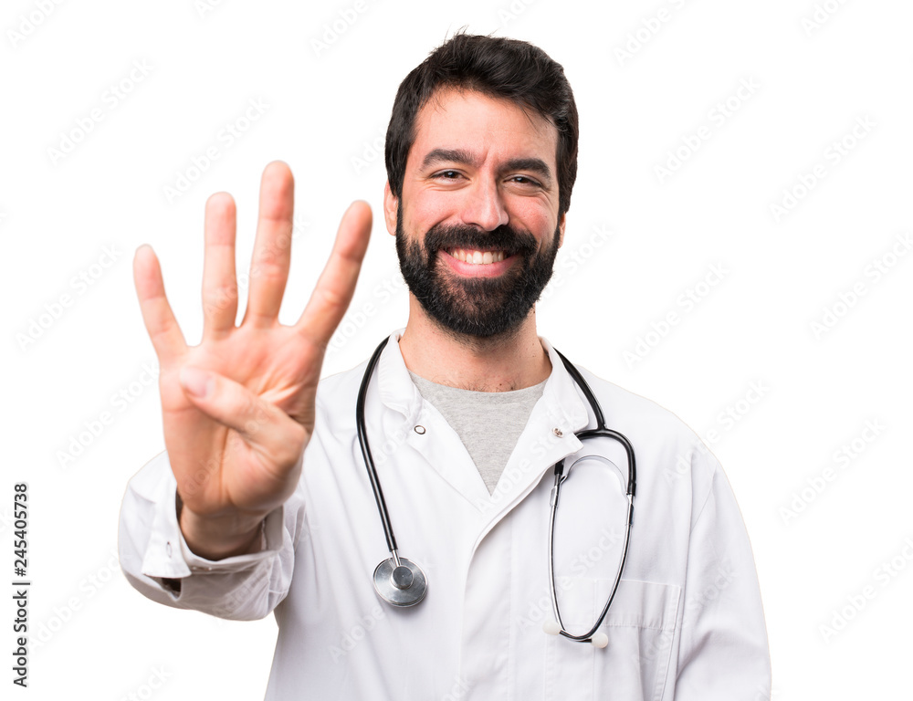 Young doctor counting four on white background Young doctor counting four on white background