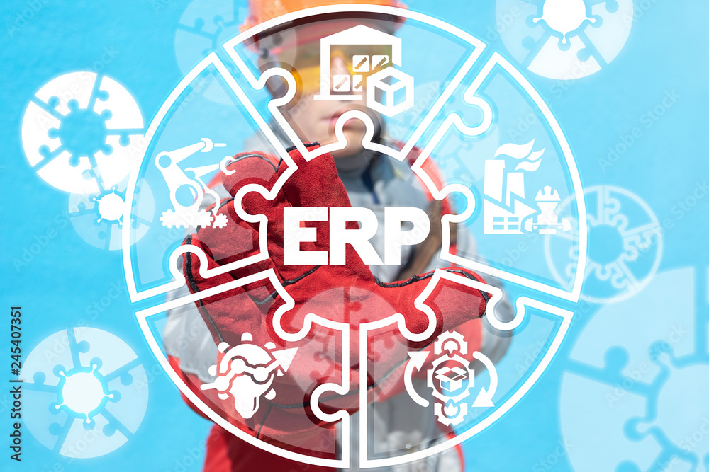 Fototapeta premium Industry worker working on a virtual screen of the future and sees the abbreviation: ERP. Erp enterprise resources planning industrial concept.