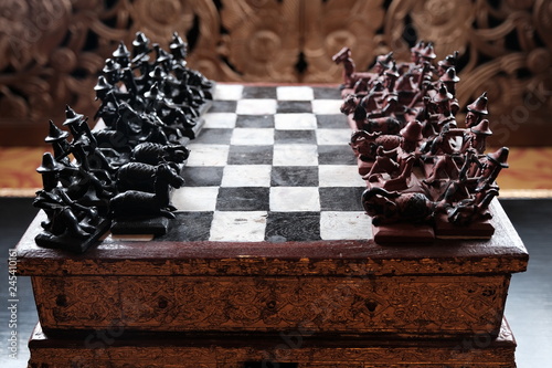 Wooden traditional ancient chess set - soft focus photo