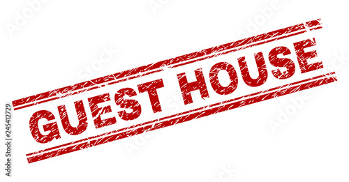 GUEST HOUSE seal print with distress style. Red vector rubber print of GUEST HOUSE tag with scratched texture. Text tag is placed between double parallel lines.