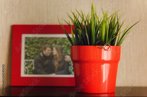 young wedding couple and rose bouquet