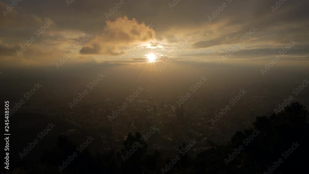 Sunset to night timelapse sun going down over city of Bogota, Colombia
