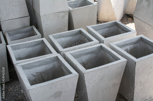 Rectangular concrete pots for plants in store