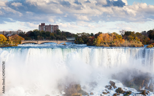 Niagara Falls. A close up view of the American Falls, a part of the Niagara Falls. The falls straddle the border between America and Canada.