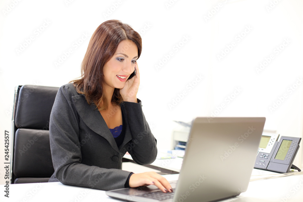business woman working on her laptop business woman working on her laptop