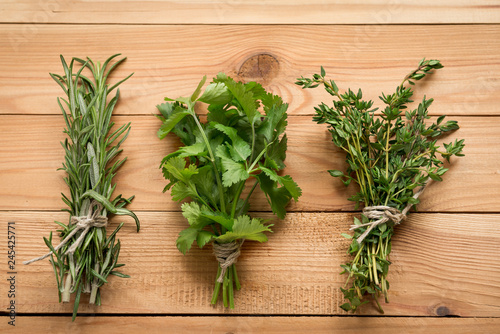 Bunch of rosemary, coriander and thyme, organic plants for healthy food