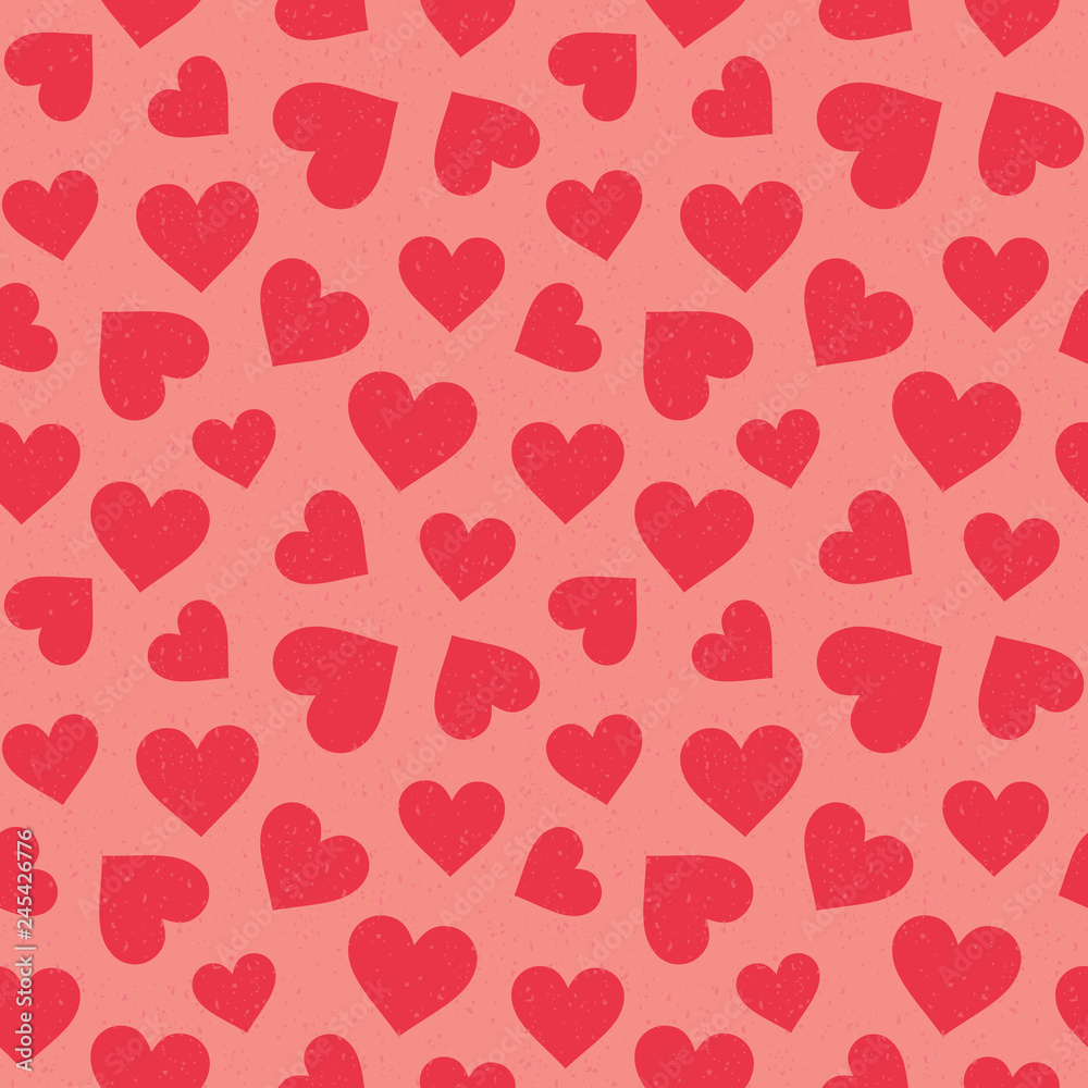 Cute seamless hipster hearts background in coral red on blush pink. Minimal seamless love pattern for Valentine's Day, scrapbook, greeting card, gift wrapping paper, fashion, textiles, fabric.