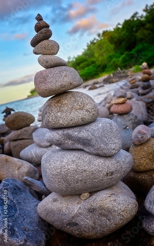 Rocks tower on a sunny beach