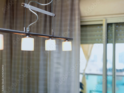 Modern interior with electric lamps