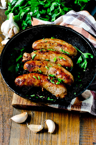 Homemade sausages from turkey (chicken) fried in a frying pan